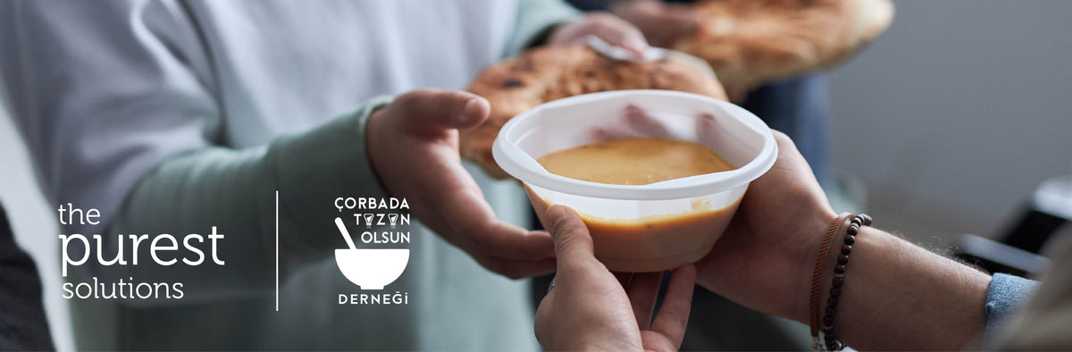 The Purest Solutions ve Çorbada Tuzun Olsun Derneği logoları; bir kâse çorba uzatan eller